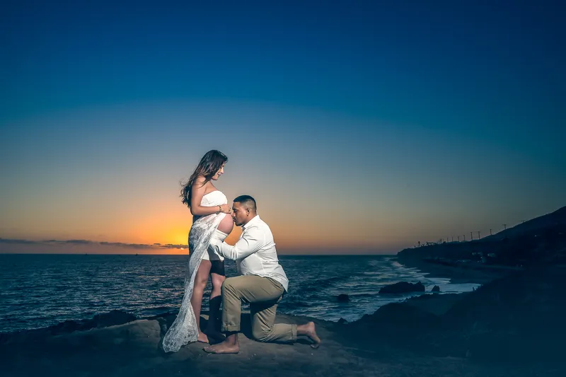Maternity portrait at the beach at sunset