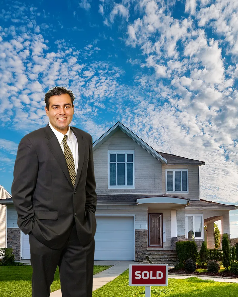 Personal branding composite portrait of a man in a suit in front of a house with a sold sign, styled for real estate marketing